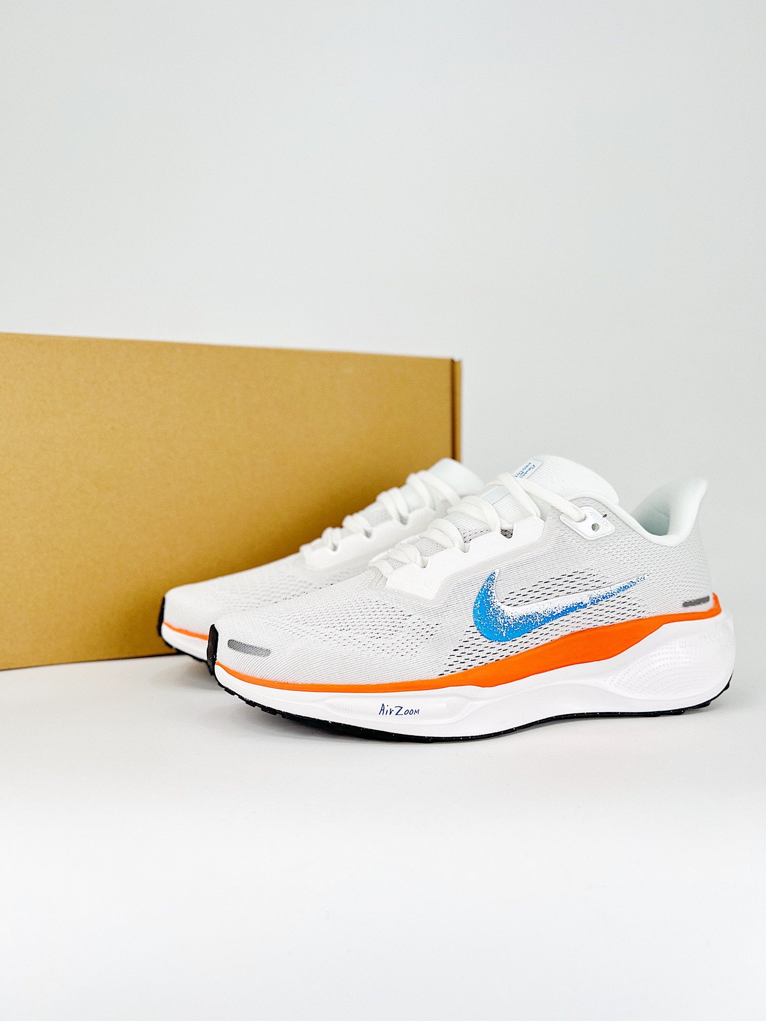 Nike Pegasus 41 - Branco/Laranja/Azul