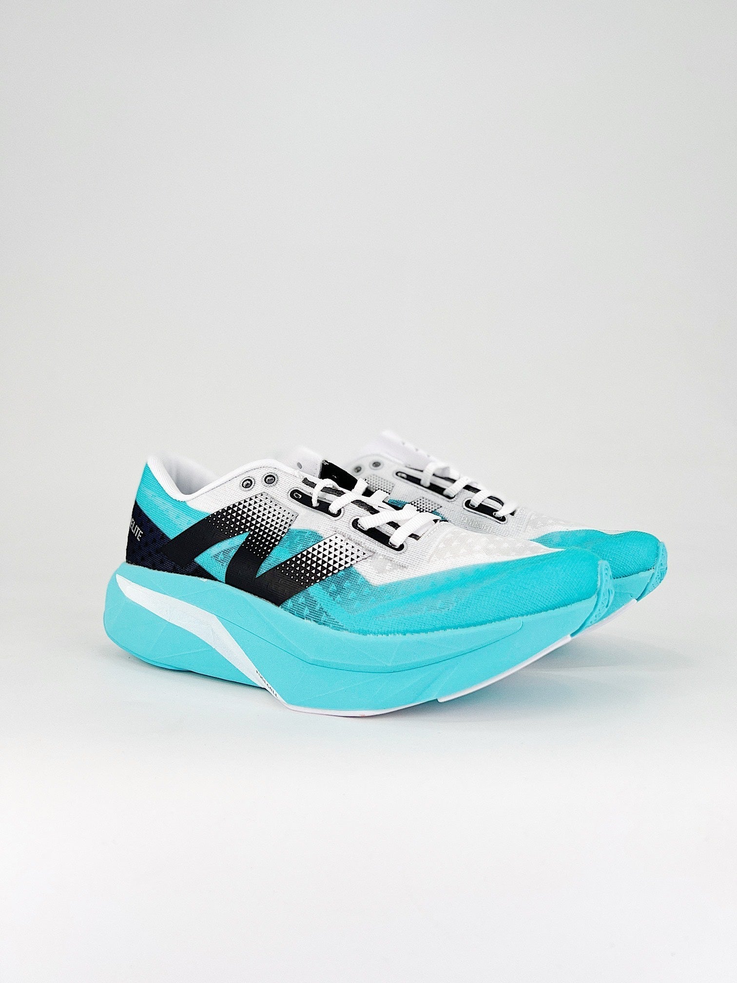 Tênis New Balance Fuelcell Supercomp Elite V4 - Turquesa/Preto