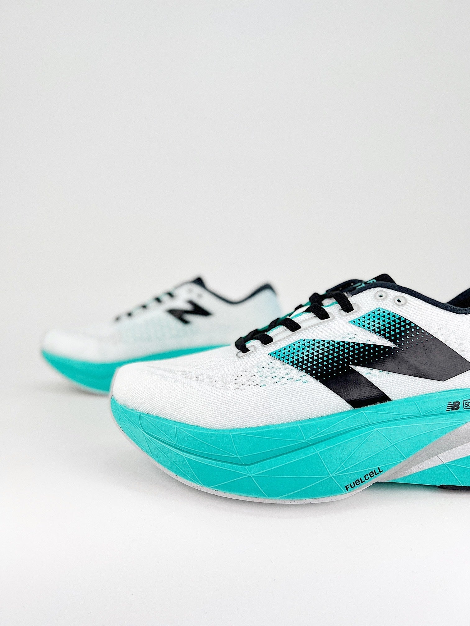 Tênis New Balance Fuelcell Supercomp Trainer V3 - Turquesa/Branco