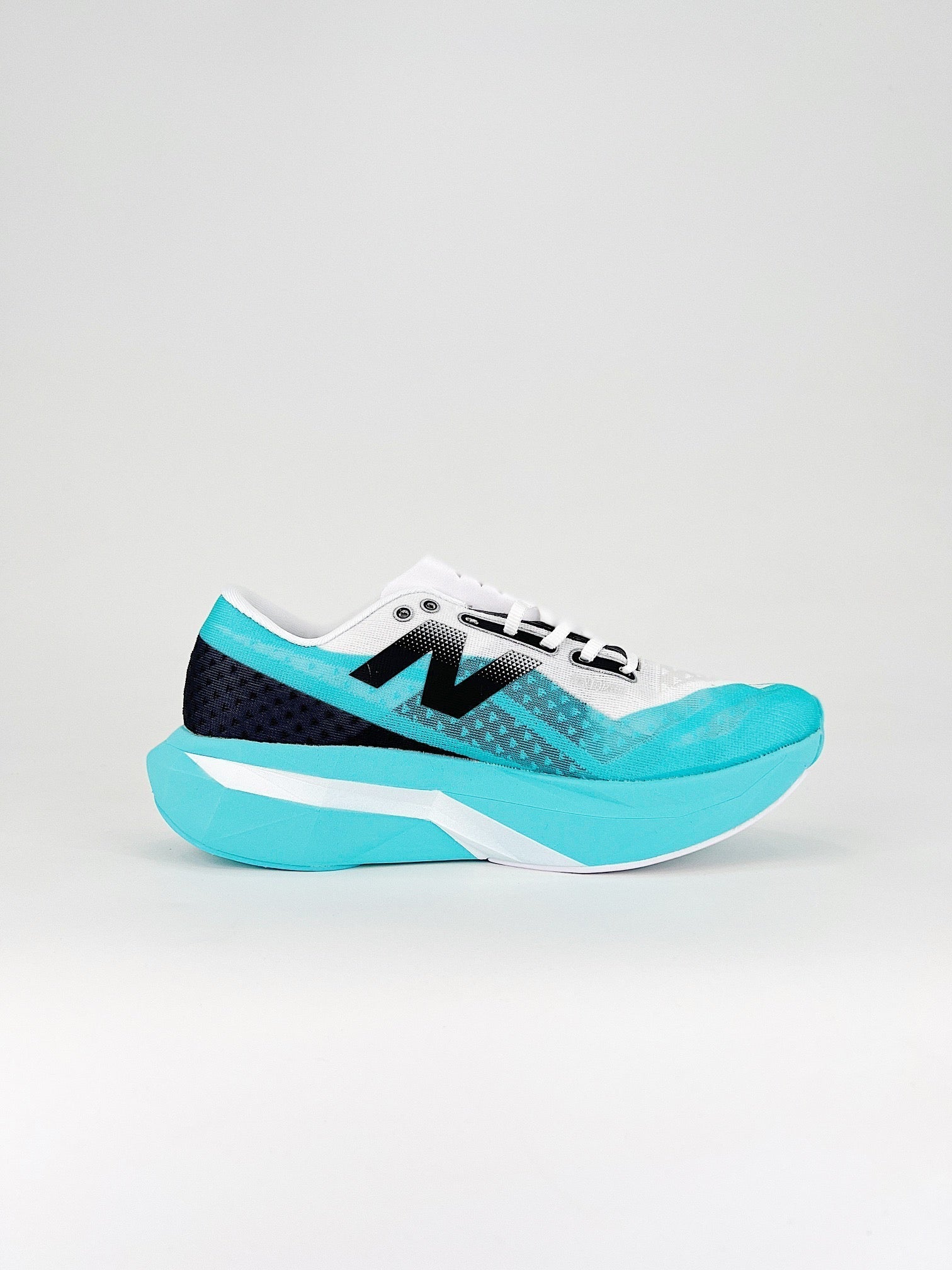 Tênis New Balance Fuelcell Supercomp Elite V4 - Turquesa/Preto