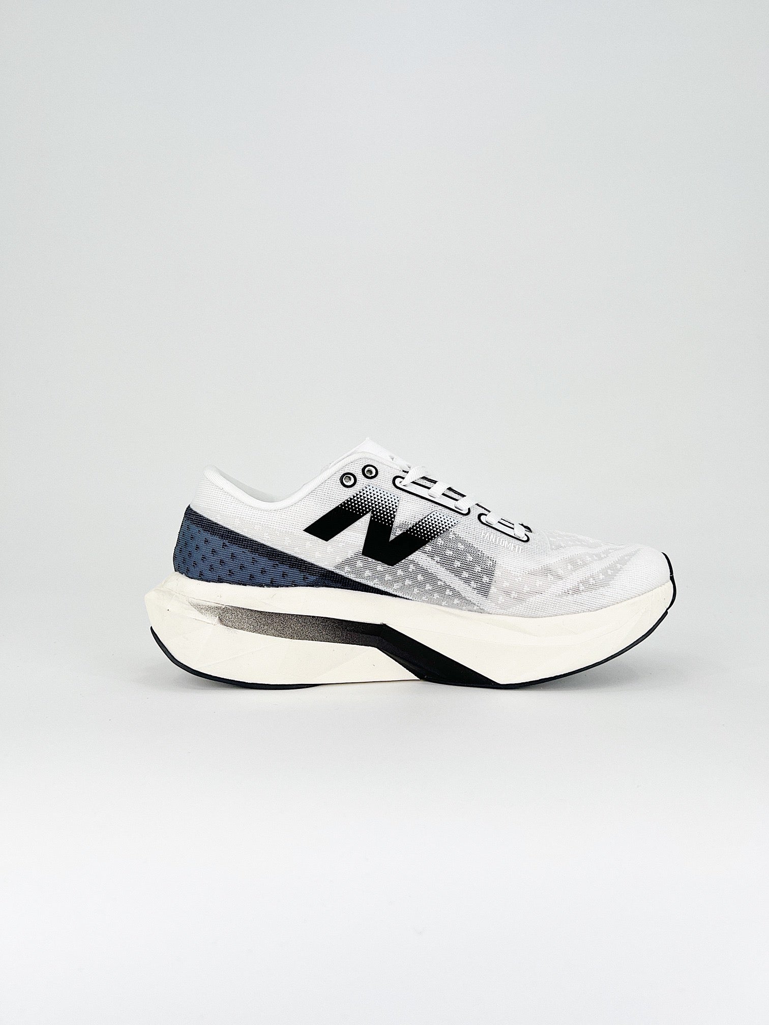 Tênis New Balance Fuelcell Supercomp Elite V4 - Branco/Preto