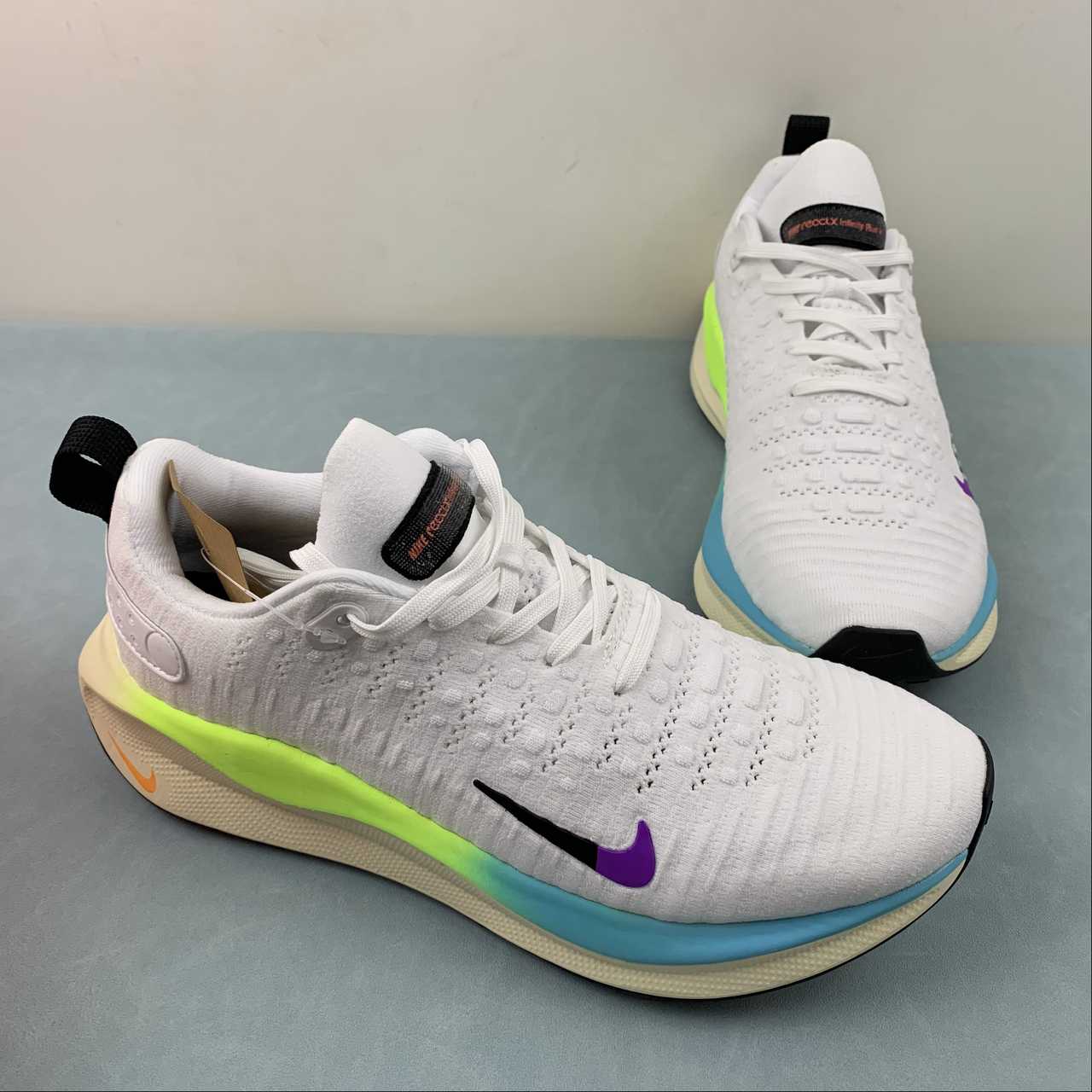 Nike Infinity Run 4 - Branco/Azul/Amarelo