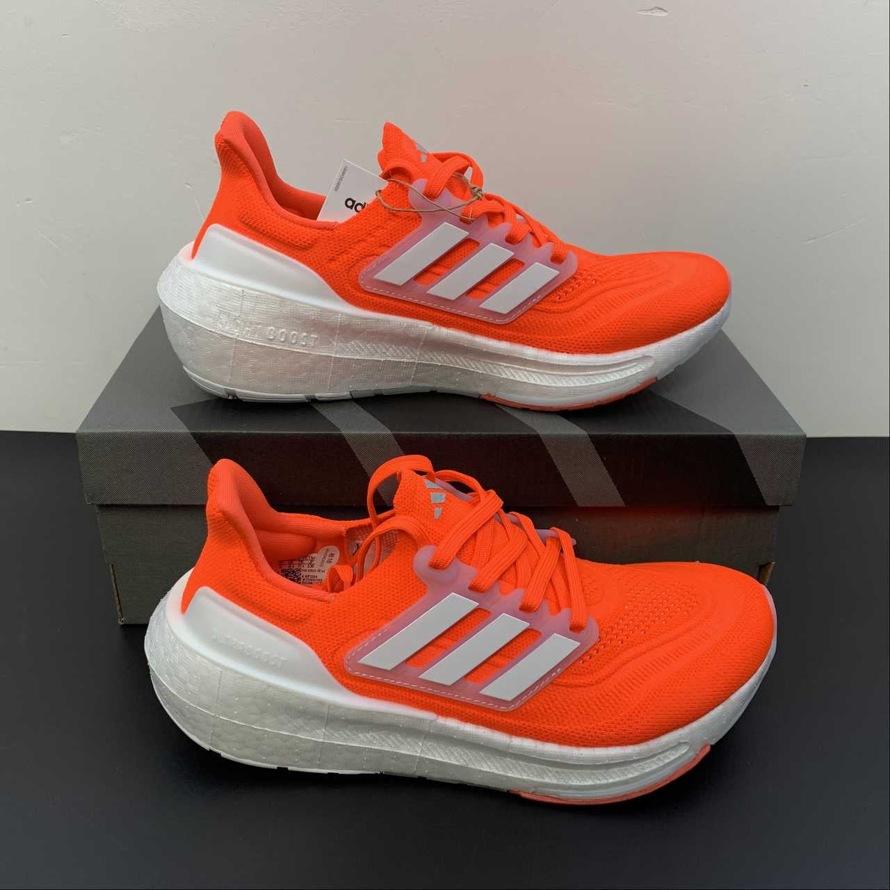 Adidas Ultraboost Light 23 - Laranja/Branco