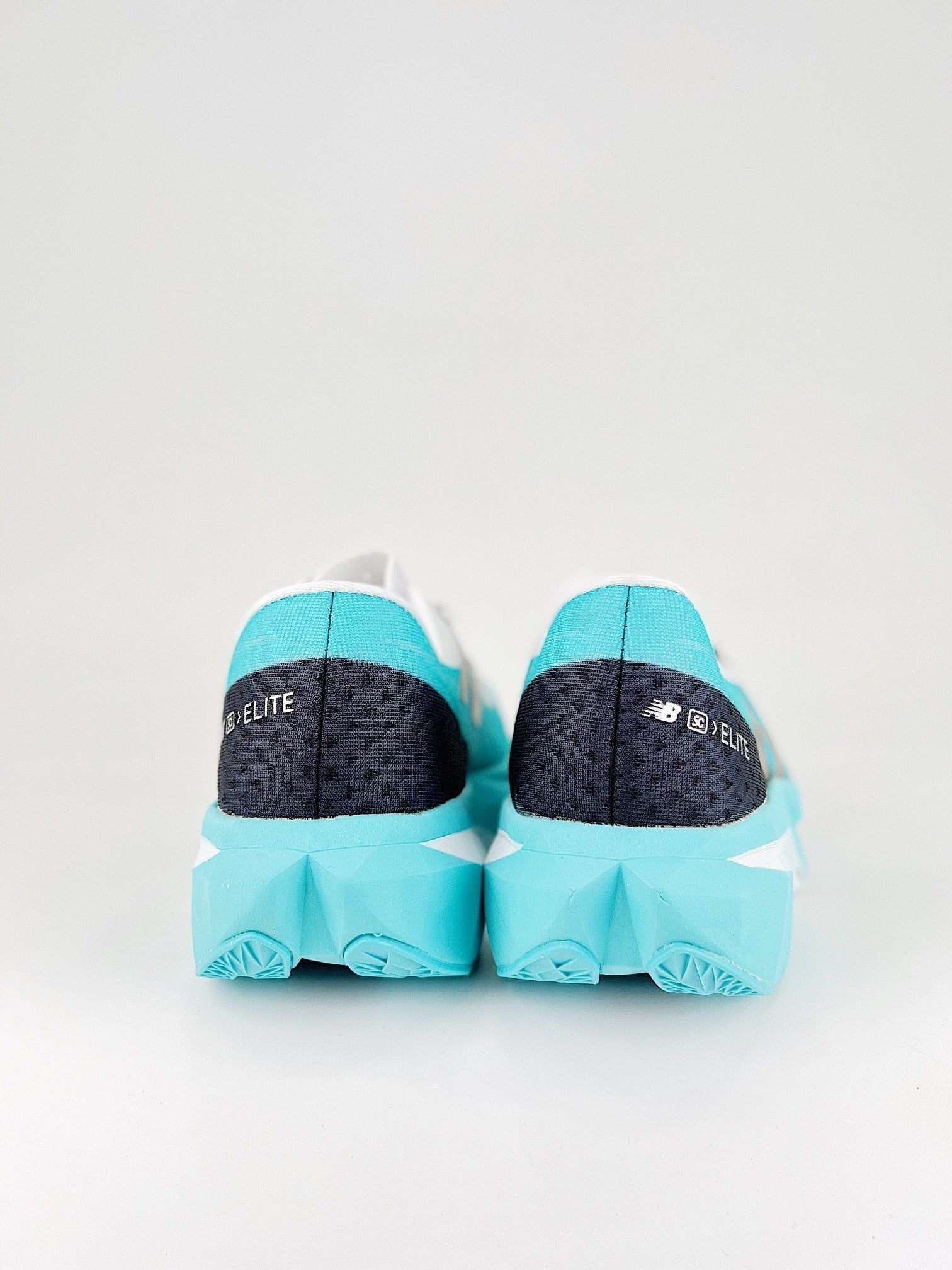 Tênis New Balance Fuelcell Supercomp Elite V4 - Turquesa/Preto