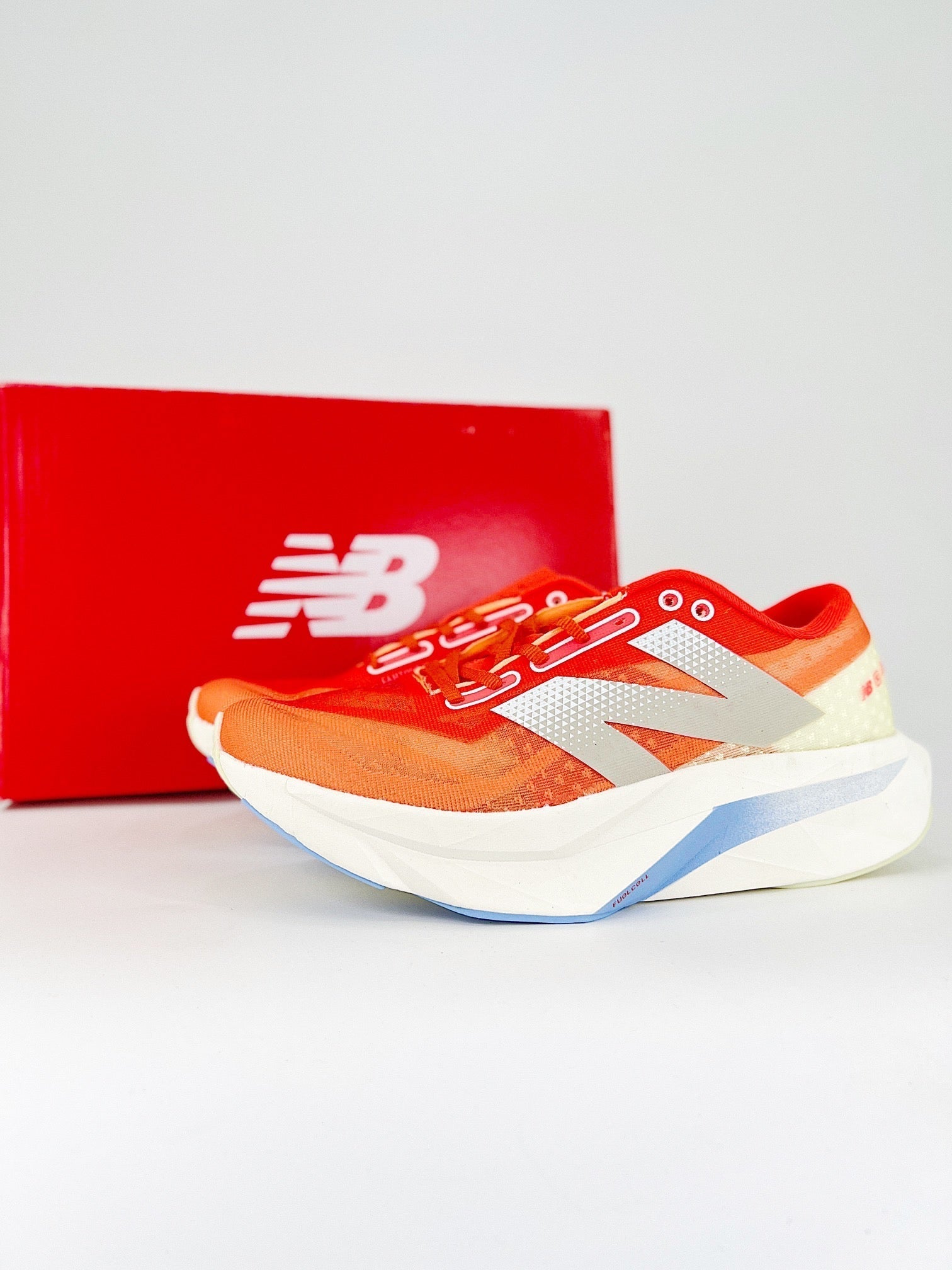 Tênis New Balance Fuelcell Supercomp Elite V4 - Vermelho/Laranja