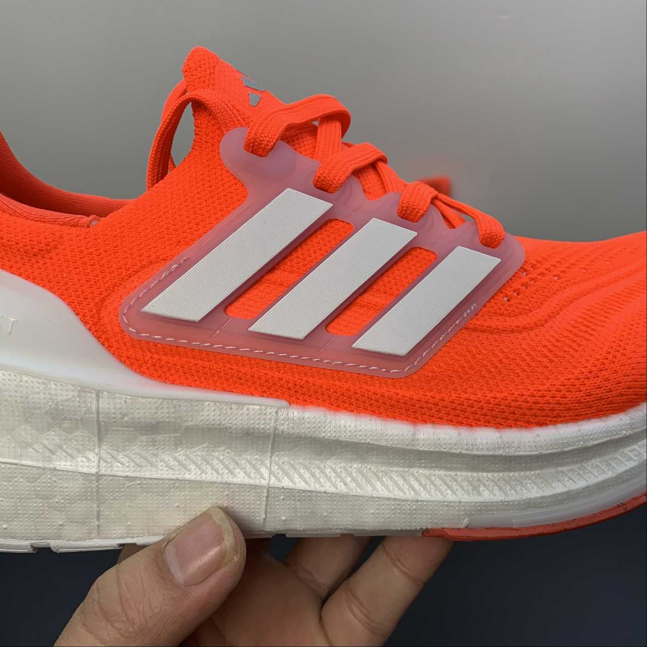 Adidas Ultraboost Light 23 - Laranja/Branco