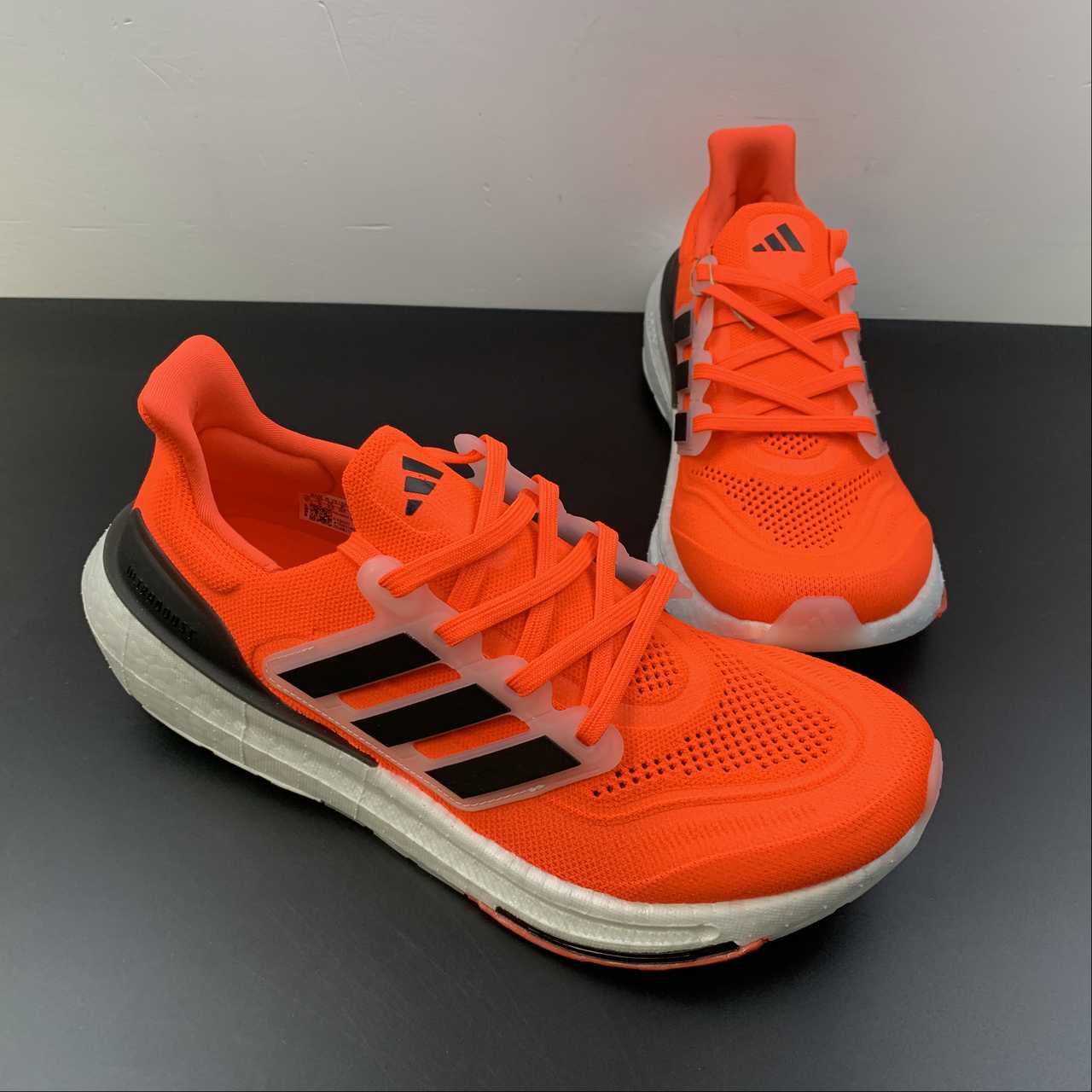 Adidas Ultraboost Light 23 - Laranja/Preto
