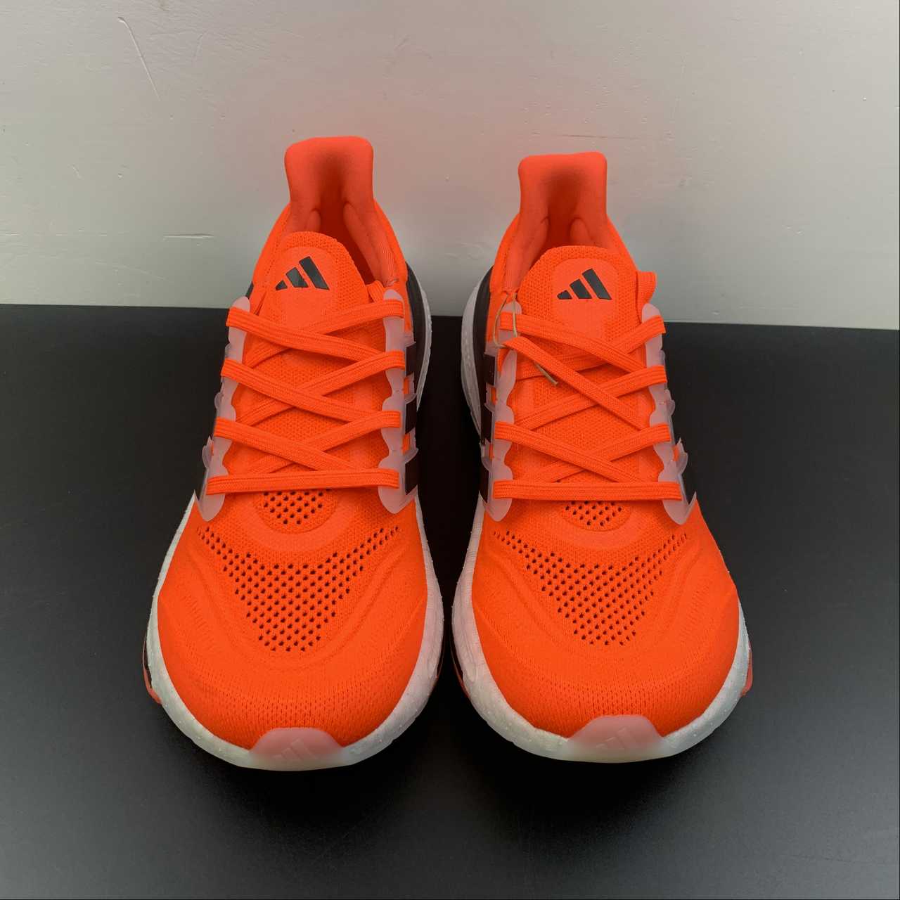 Adidas Ultraboost Light 23 - Laranja/Preto