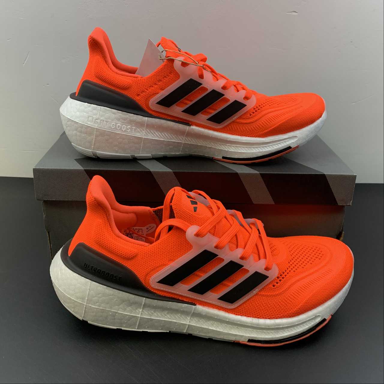 Adidas Ultraboost Light 23 - Laranja/Preto