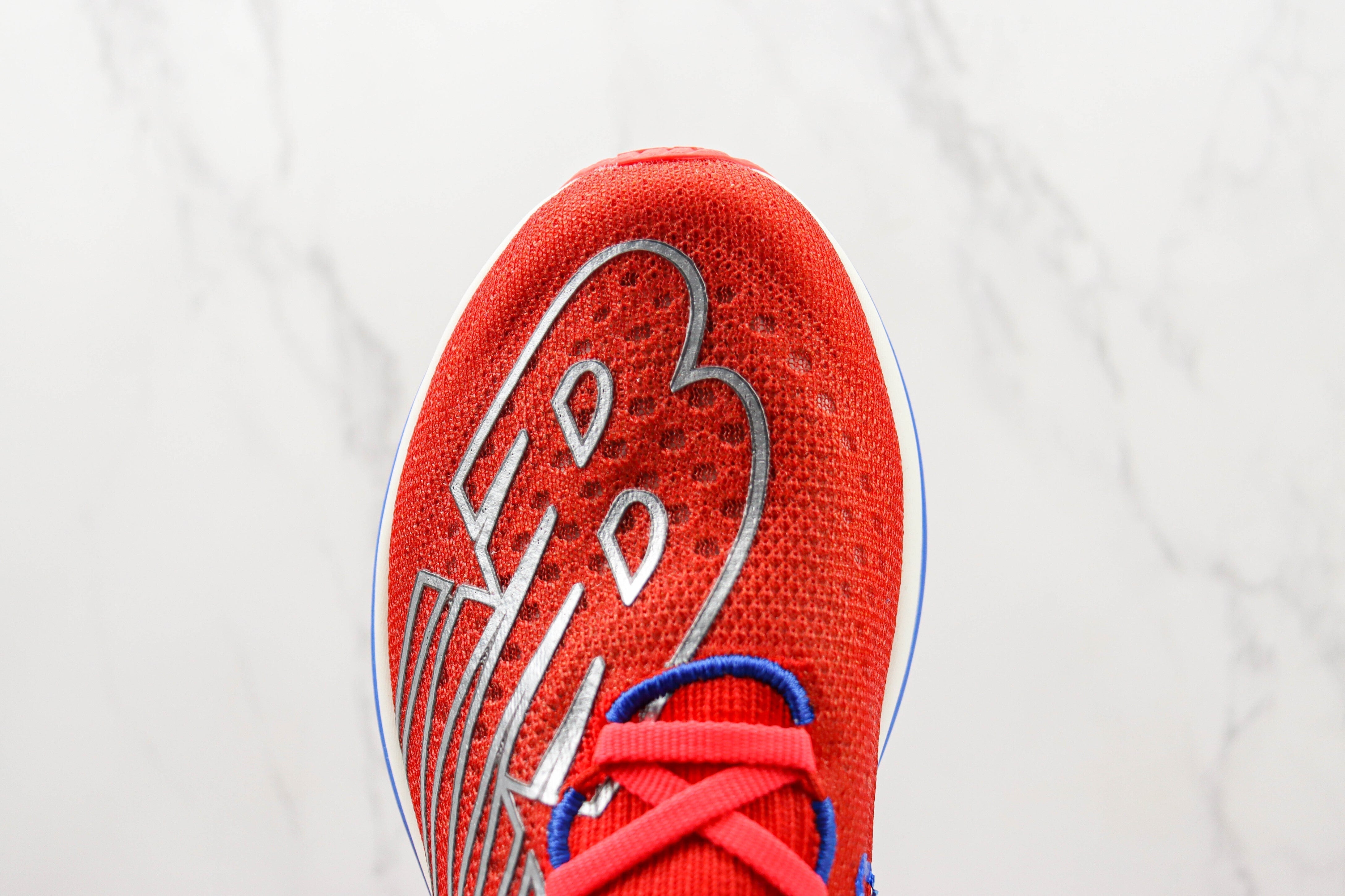 Tênis New Balance Fuelcell Supercomp Elite V3 - Vermelho/Roxo