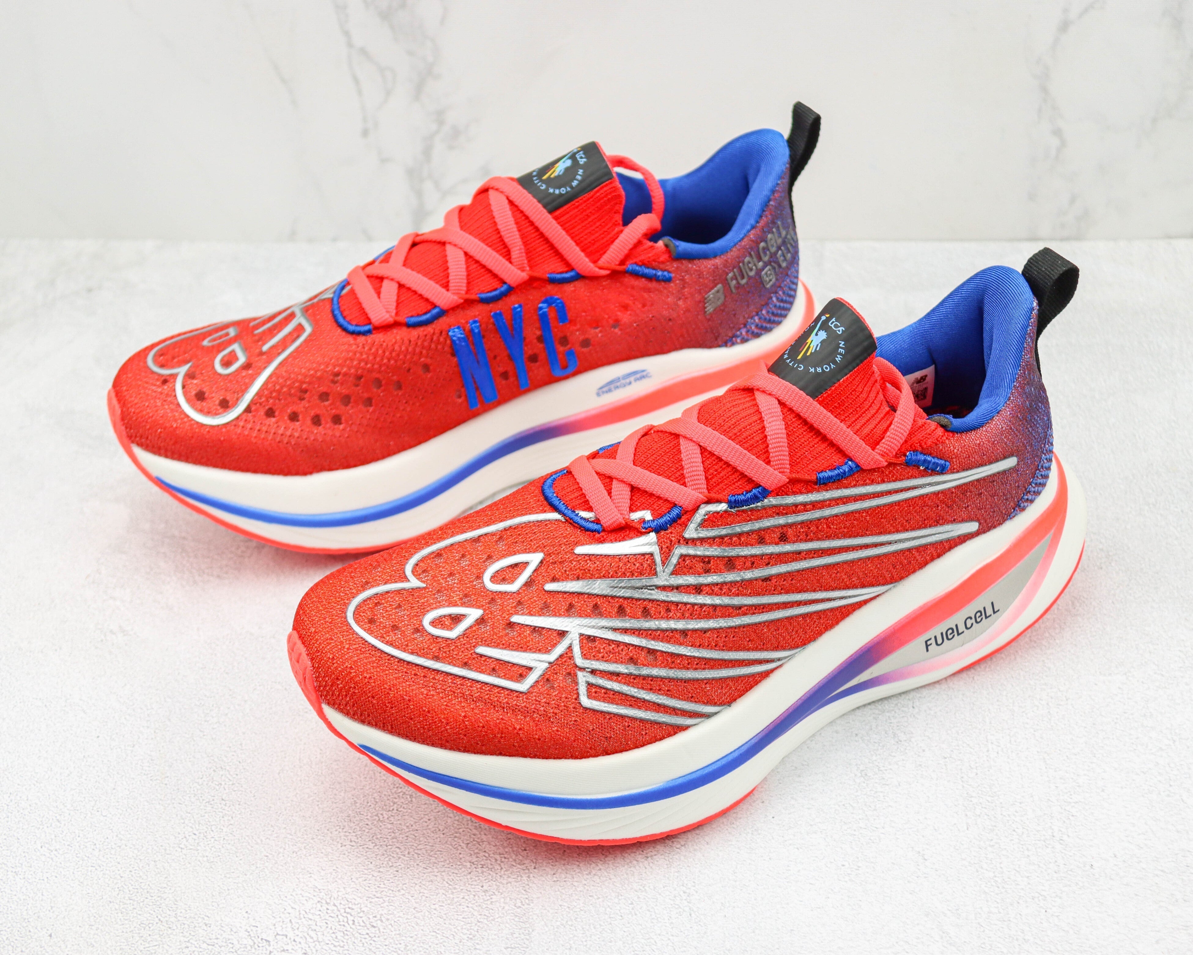 Tênis New Balance Fuelcell Supercomp Elite V3 - Vermelho/Roxo