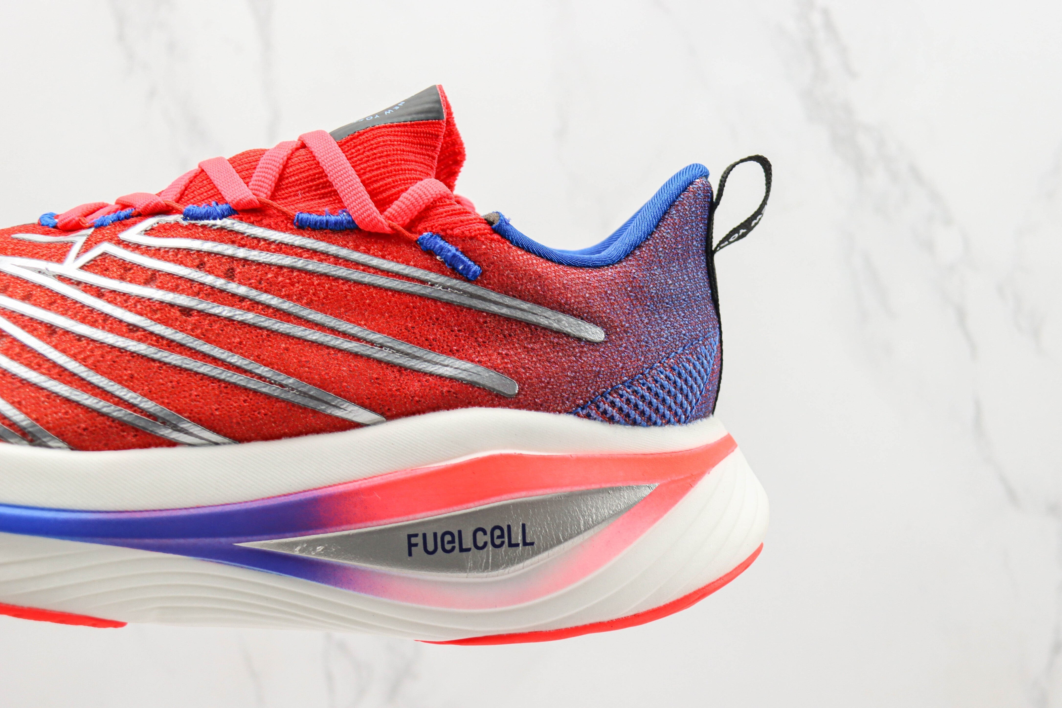 Tênis New Balance Fuelcell Supercomp Elite V3 - Vermelho/Roxo