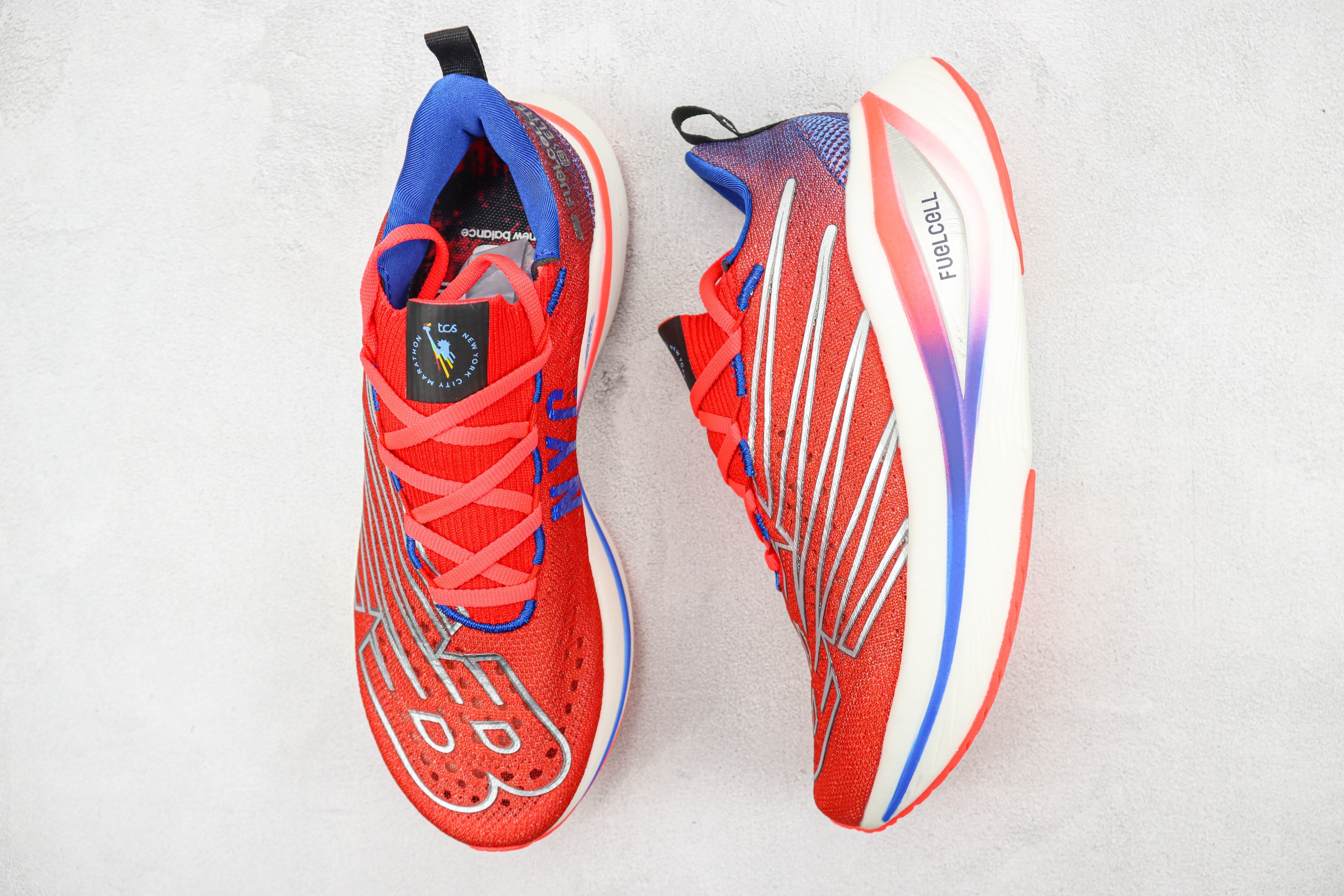 Tênis New Balance Fuelcell Supercomp Elite V3 - Vermelho/Roxo