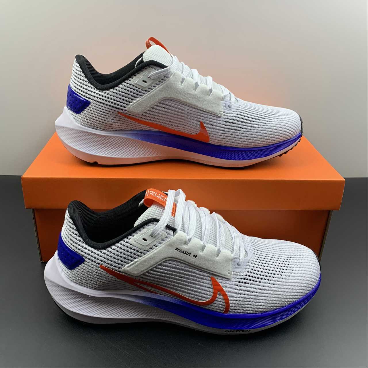 Nike Air Zoom Pegasus 40 - Branco/Azul/Laranja
