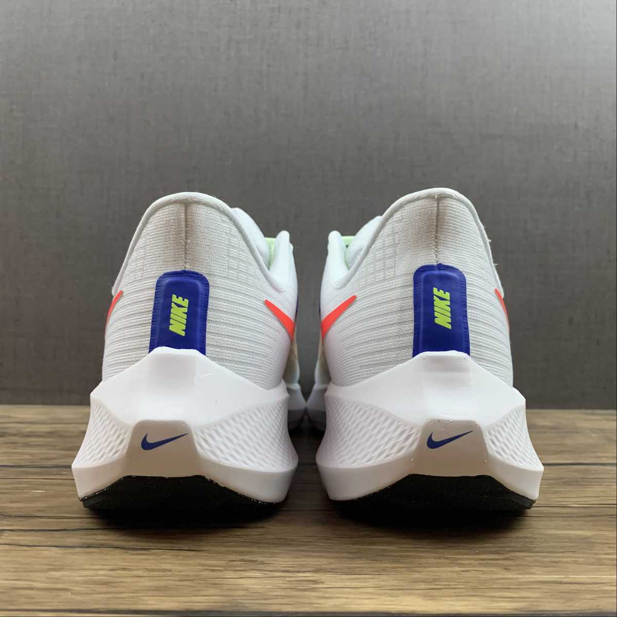Nike Air Zoom Pegasus 39 - Branco/Azul/Laranja