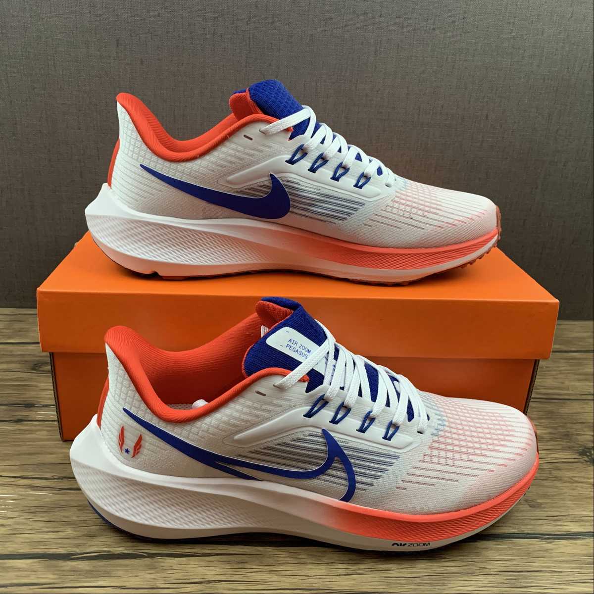 Nike Air Zoom Pegasus 39 - Branco/Laranja/Azul