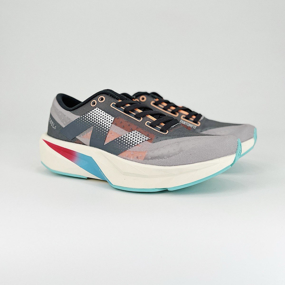 New Balance FuelCell Rebel V4 - Cinza/Azul